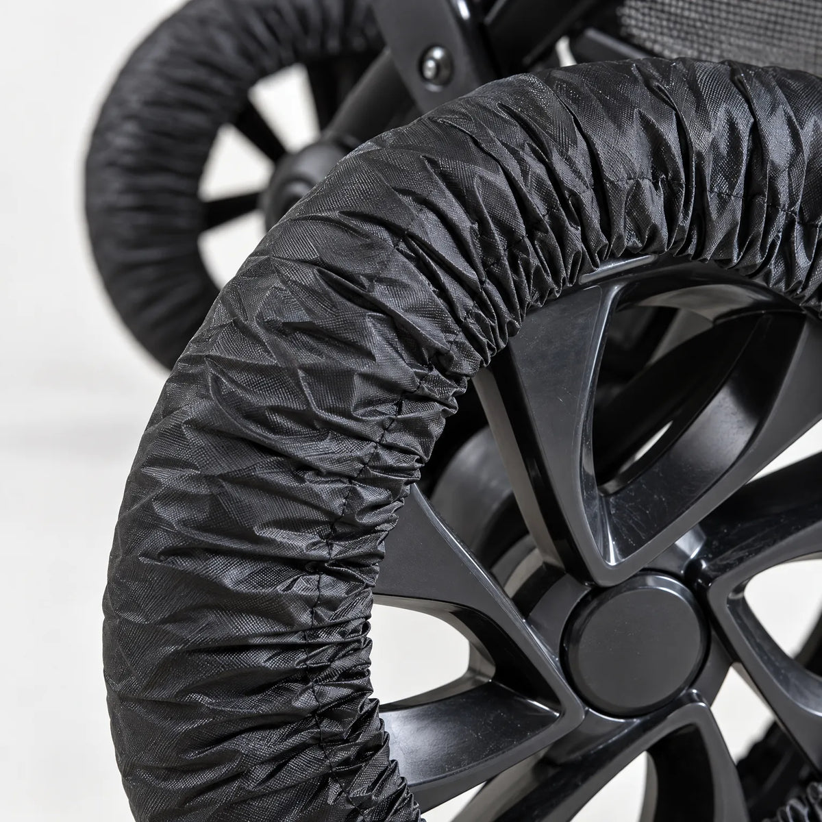 WheelyGuard  - Elasticated Pushchair Wheel Covers Protecting Indoor Floors